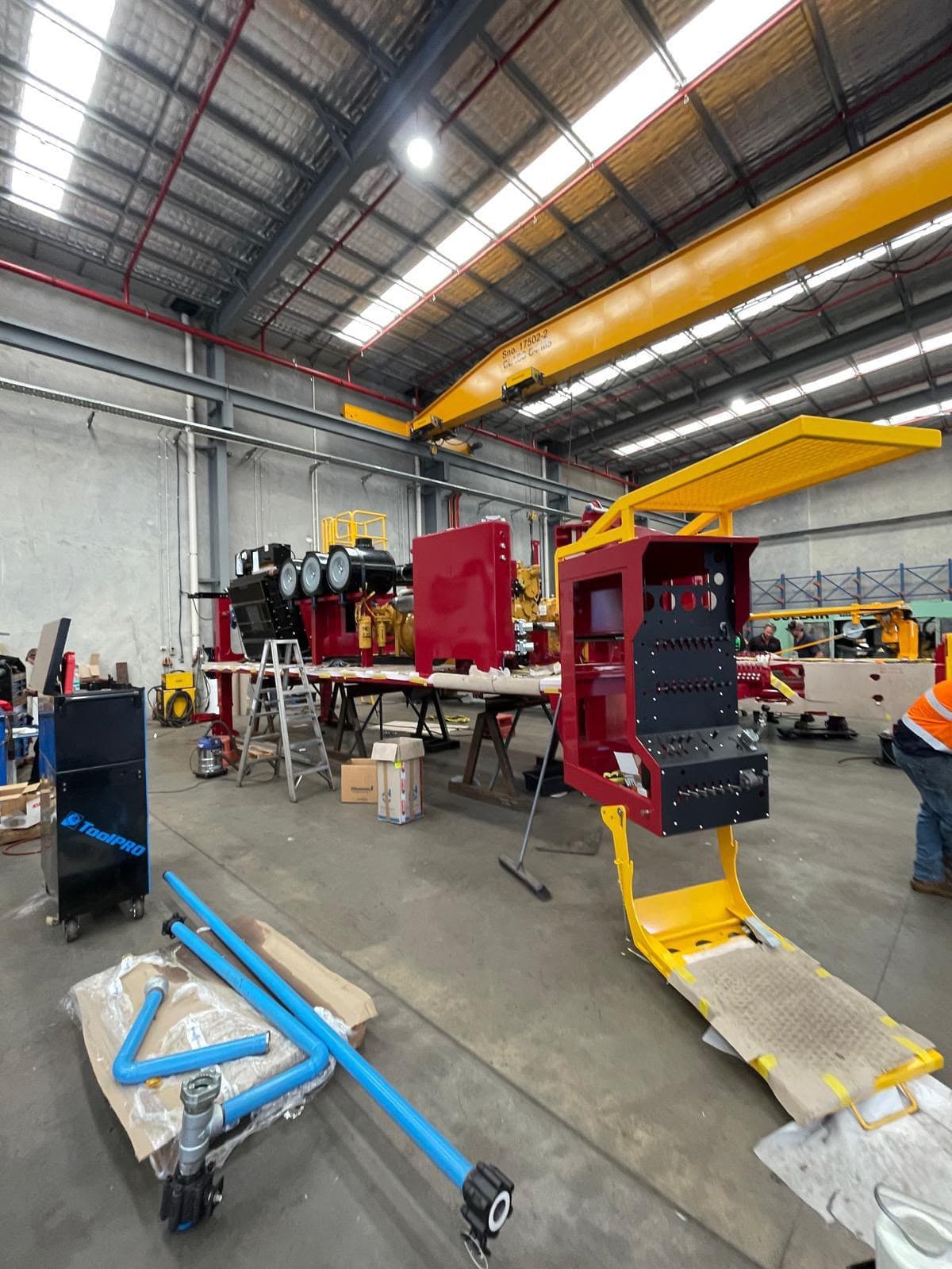 OX-SR72 drill rig modules under assembly on an Australian workshop floor